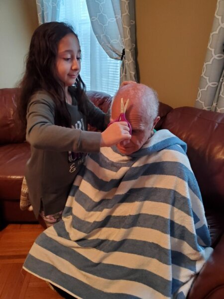 Angelina Cutting her Grandpa's Hair