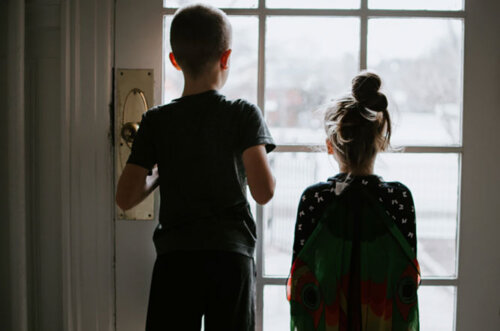 Unsplash Kids Looking Out From Inside
