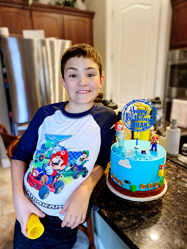 Nolan With Pokemon Cake Small